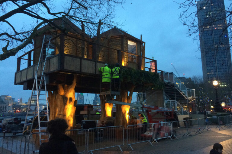 Virgin Holidays pop up Treehouse on the Thames exterior finishing touches at night