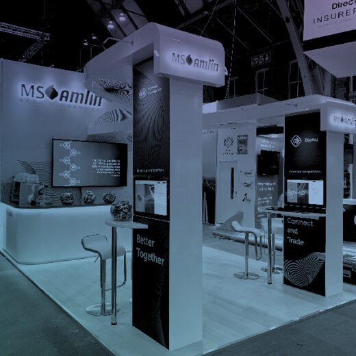 MS Amlin exhibition stand on coloured gradient overlay