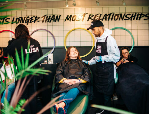 Lush-pop-up-salon-guests-chatting-with-stylist